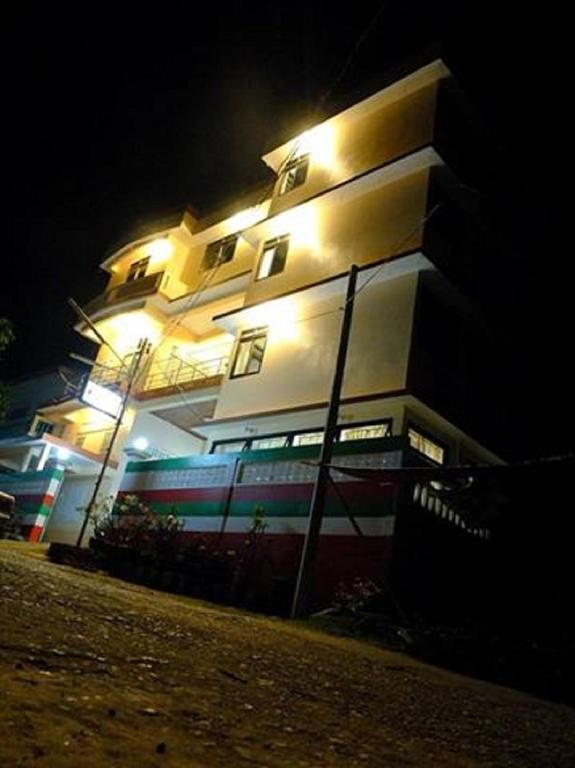 Penguin Hotel Котаунг Экстерьер фото